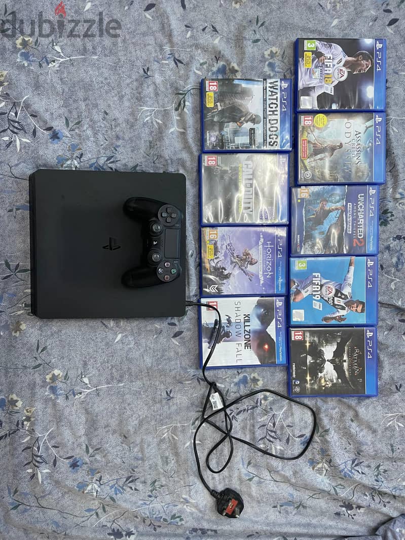 PS4 Slim with CDs 0