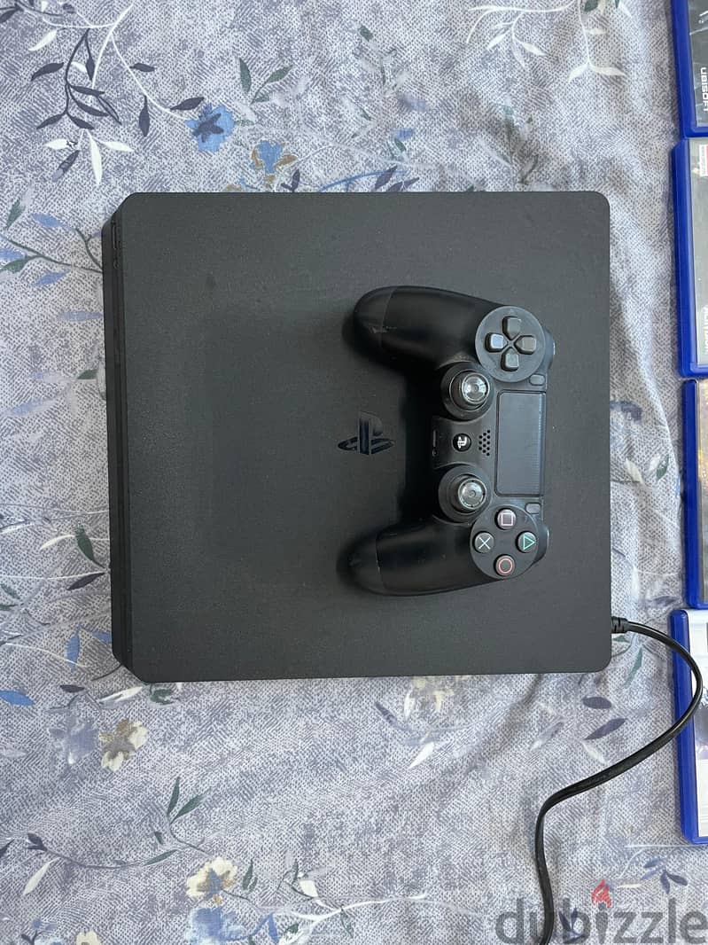 PS4 Slim with CDs 1