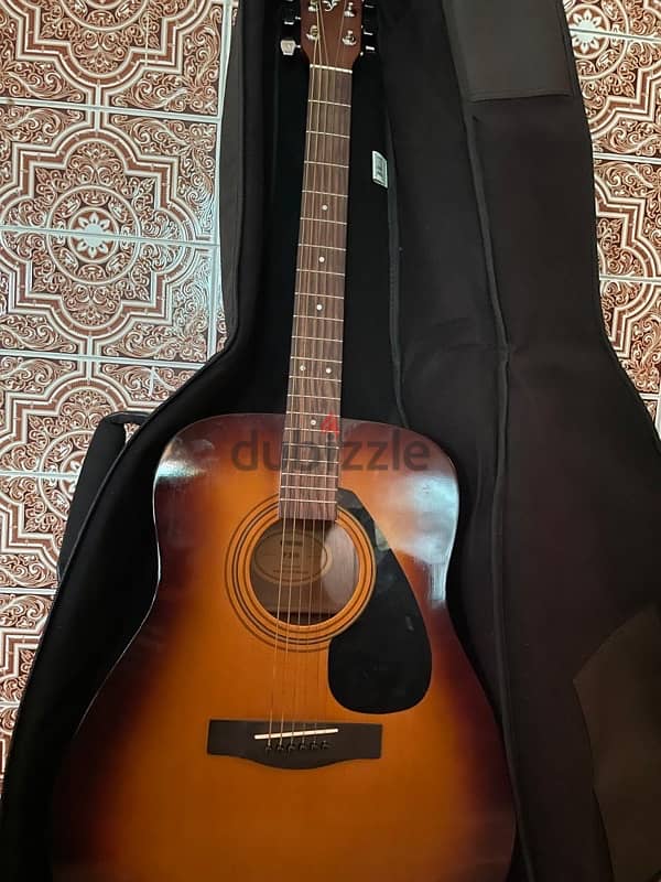 Yamaha F310 Tobacco Brown Sunburst comes with 2 picks and guitar bag 2