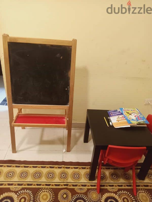 study table, dustbin, curtain,plastic containers,,rug , whiteboard 3