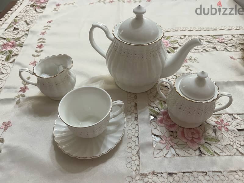 Brand new 15 piece white porcelain tea set 0