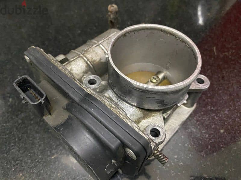 Nissan tida throttle 1