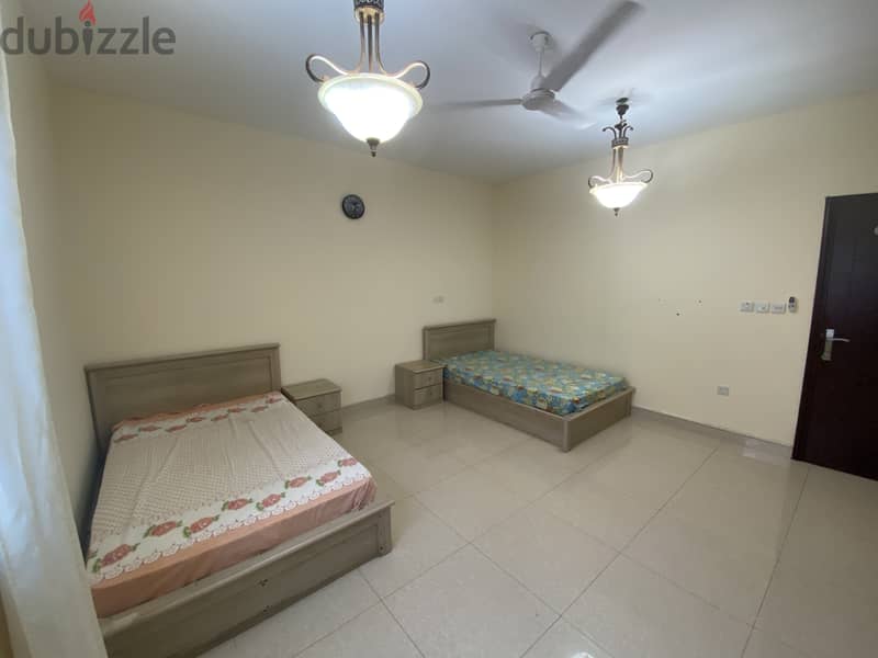 Spacious Fully Furnished room with private washroom in Al Ghubra 5