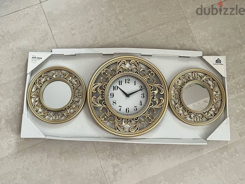 Brand new golden wall clock and mirror 0