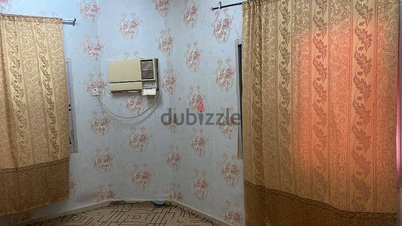 Room with attached toilet in qurum 1