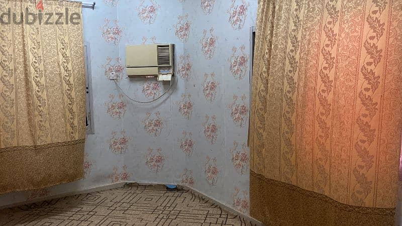 Room with attached toilet in qurum 2