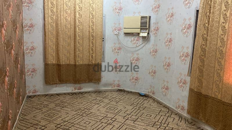 Room with attached toilet in qurum 5