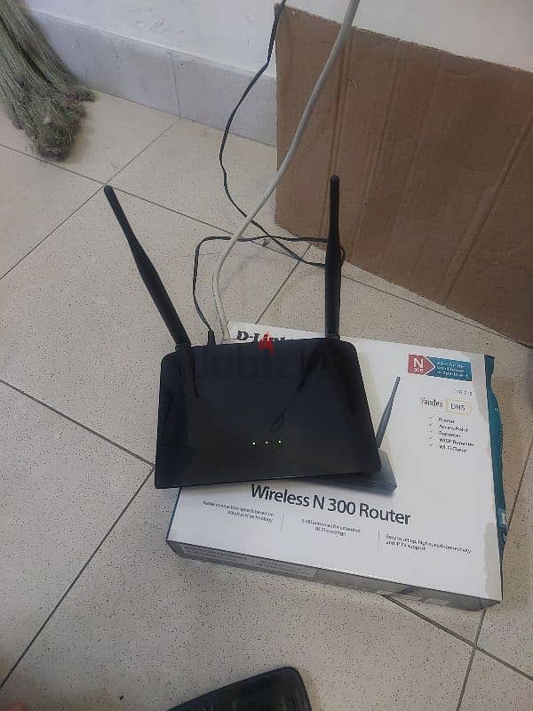 Wi-Fi ROUTER +Internet wire 6 omr. . INSIDE photo 0