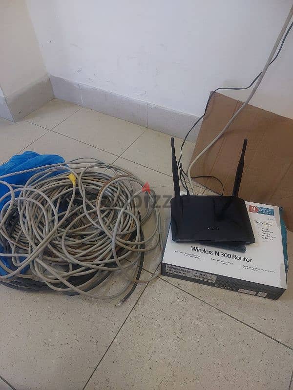 Wi-Fi ROUTER +Internet wire 6 omr. . INSIDE photo 1