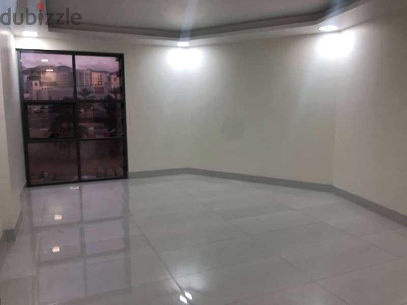 exellent location office for rent first line on main road in ghubra 2