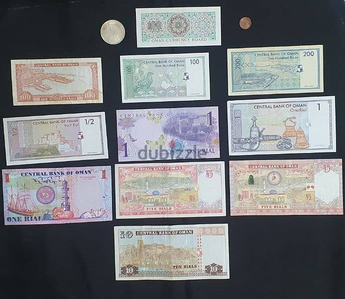 Set of 11 Omani banknotes and 2 Coins including Silver Saidi 1