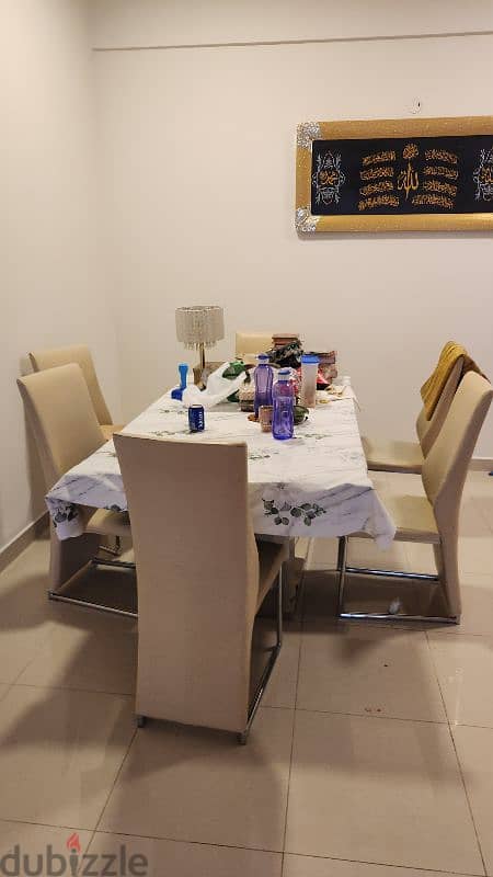 Dining table and 6 chairs 0