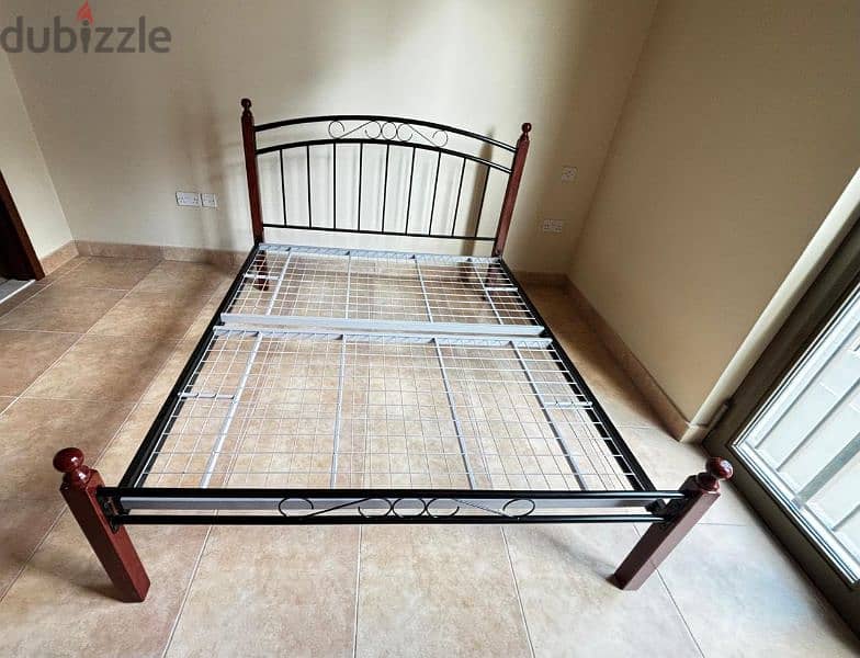 Iron bed frame with mattress 0