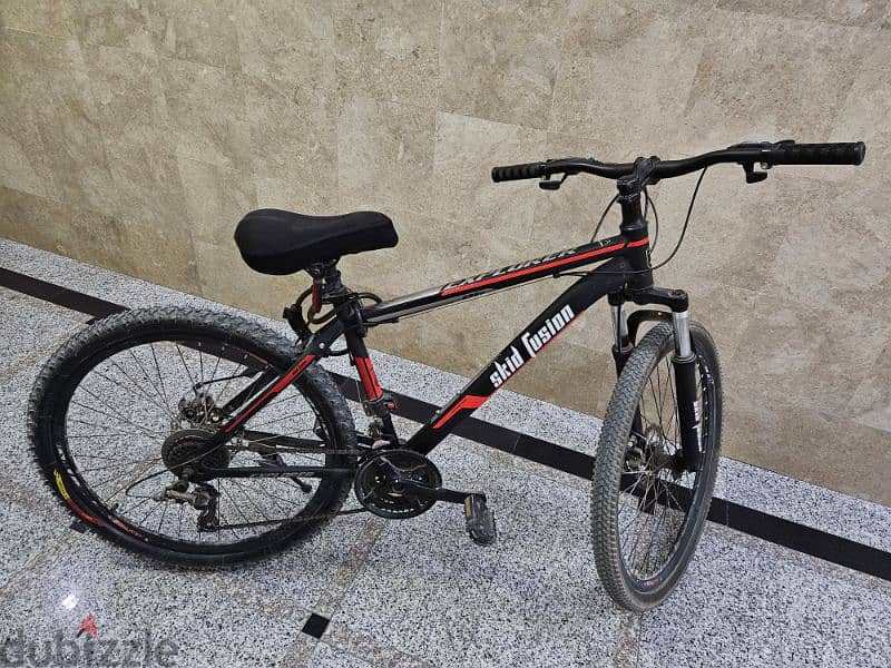 cycle with seat cover and tyre pressure refill pump 2