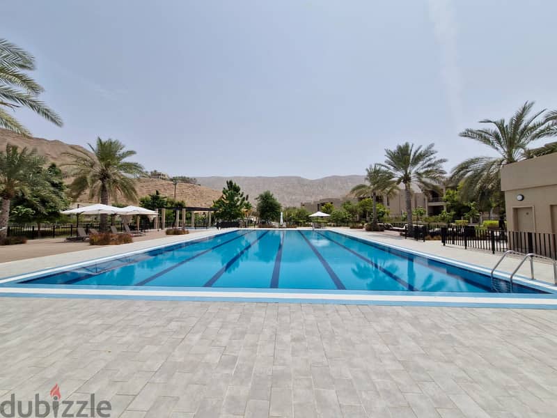 2 BR + Maid’s Room Apartment in Muscat Bay with Shared Pool 1