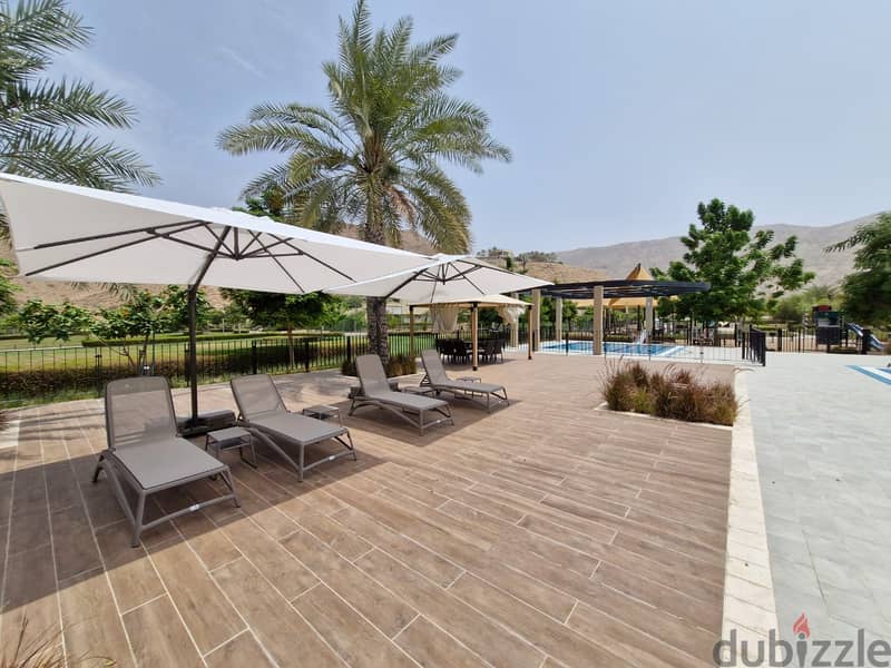 2 BR + Maid’s Room Apartment in Muscat Bay with Shared Pool 2