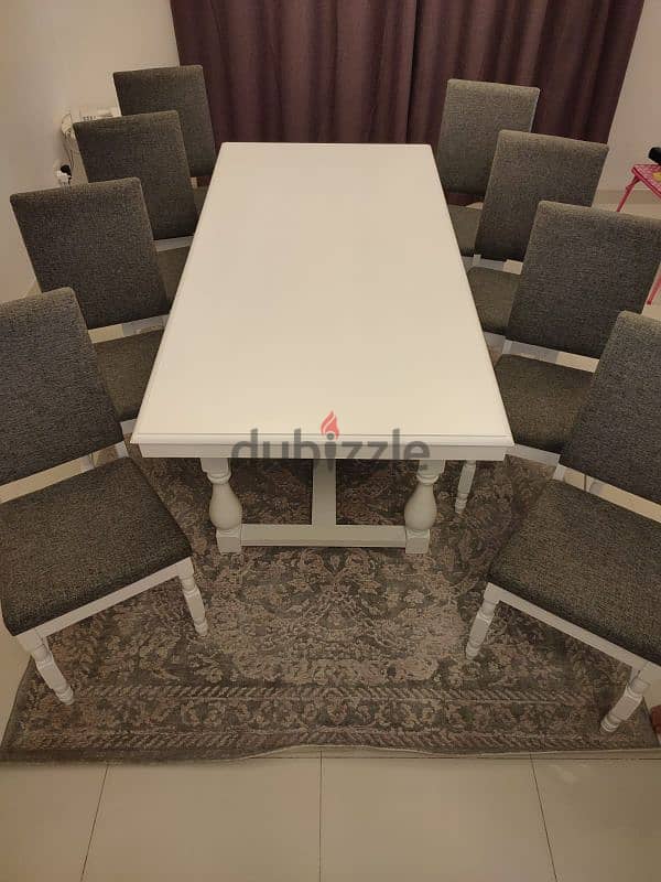 Sofa set with pillows and dinning table with 8 chairs with carpet 0