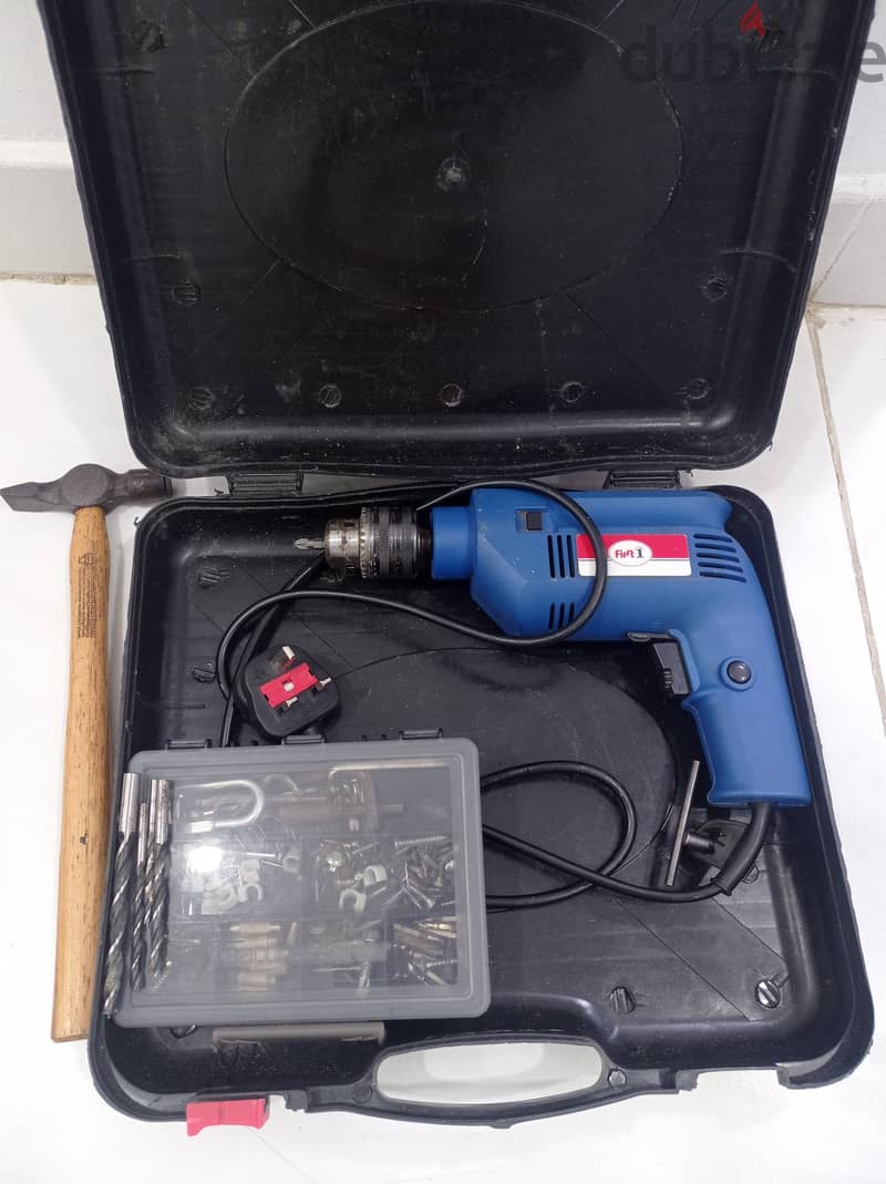 Drill machine with wooden bit set and hammer 1