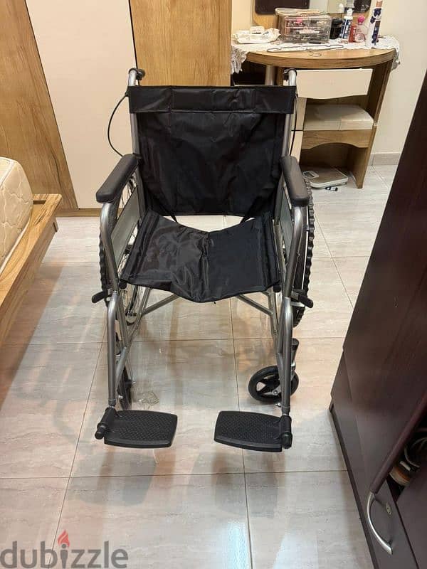 wheel chair used once it's new for sale Khuwair 1