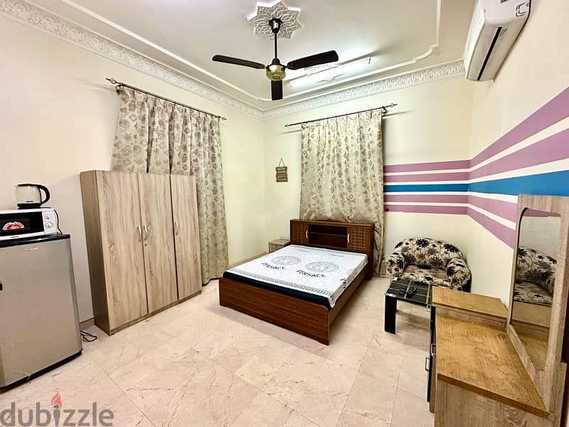 room for rent full furnished in north ghoubra behind oman oil 0