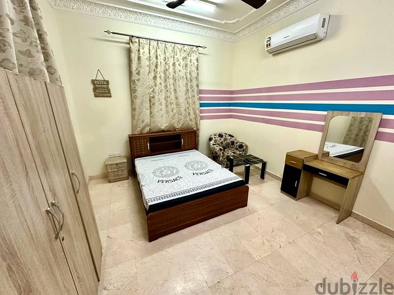 room for rent full furnished in north ghoubra behind oman oil 1