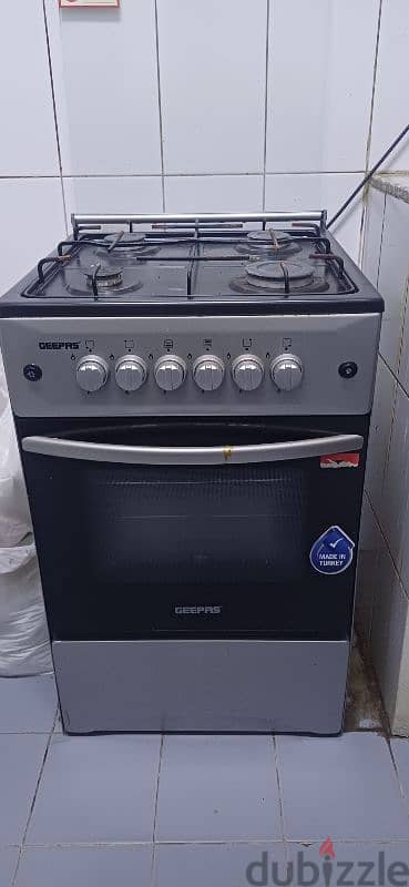 Ikon 7kg fully automatic washing machine and geepas cooking range 1