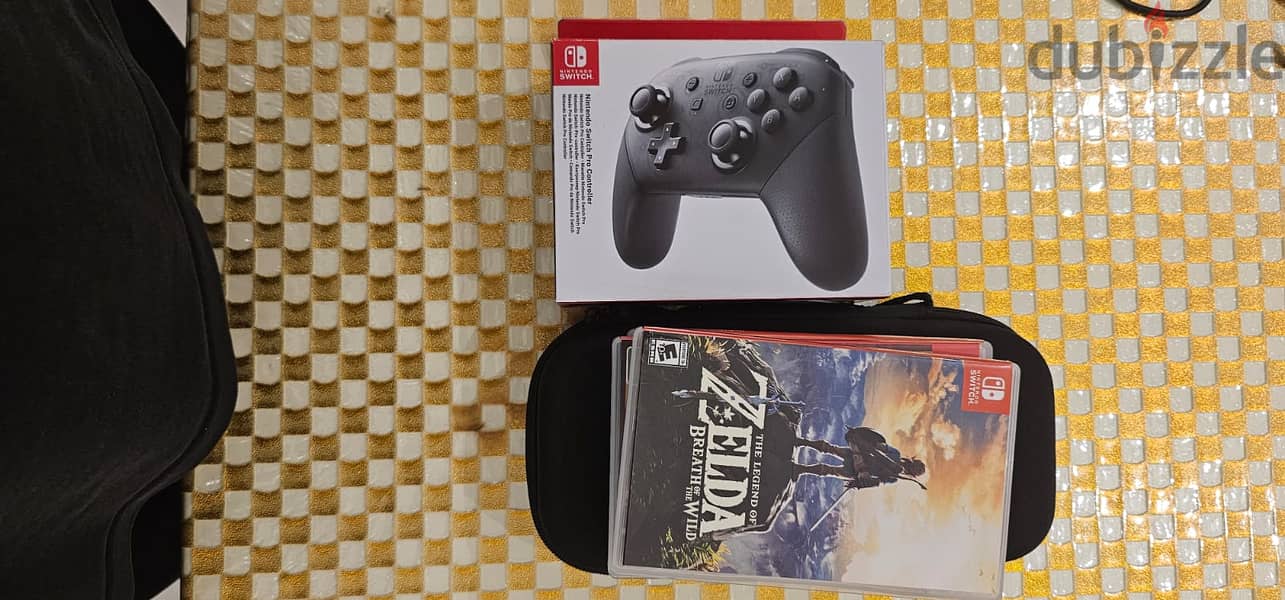 Nintendo Switch with Switch Pro Controller and 4 Games 3