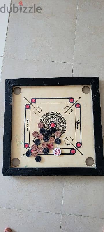 Caroom board with brand new coins 3