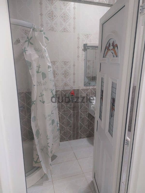 big room with bathroom in  aziba included all bills 9