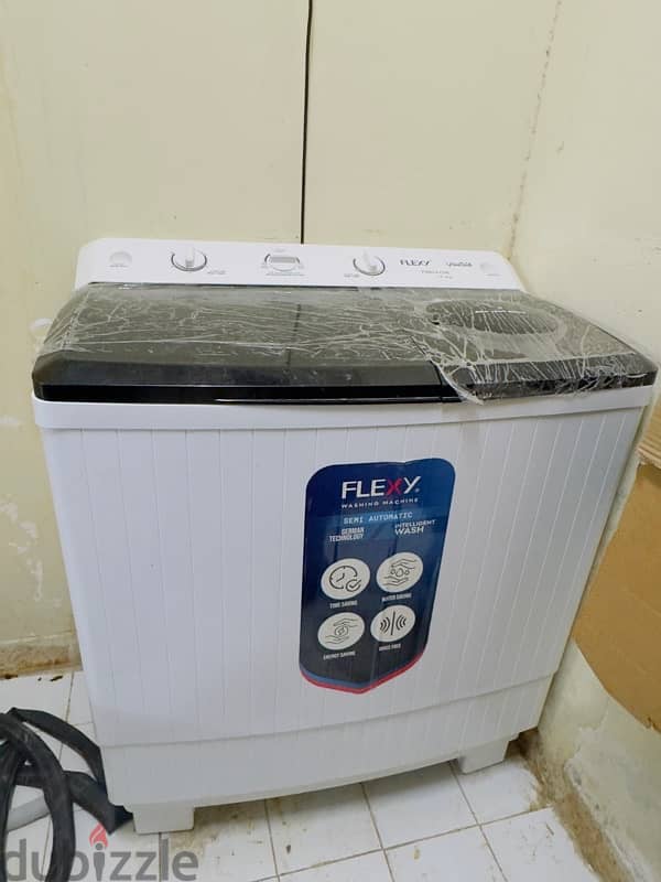 Flexy brand new box pack washing machine 14 kg 2