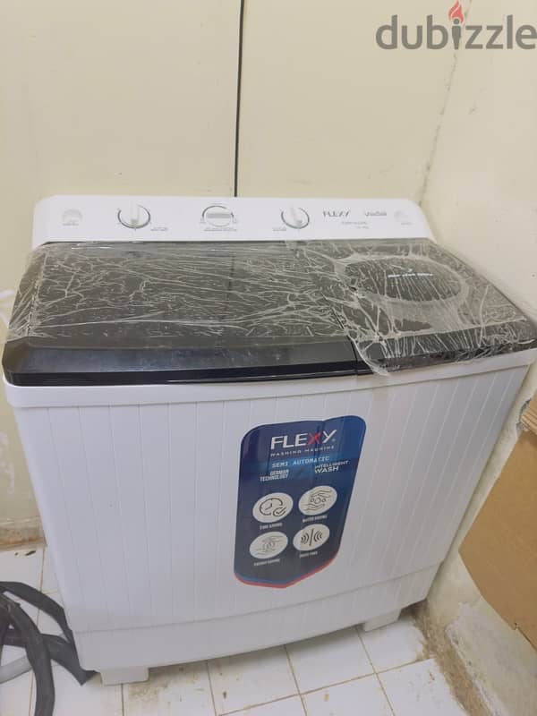 Flexy brand new box pack washing machine 14 kg 4