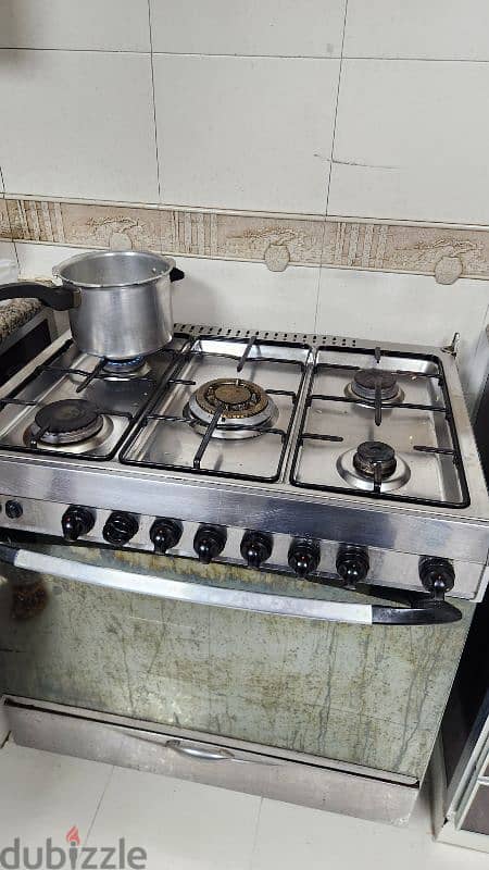 Dining table, 6 chairs and 5stove cooking range 0