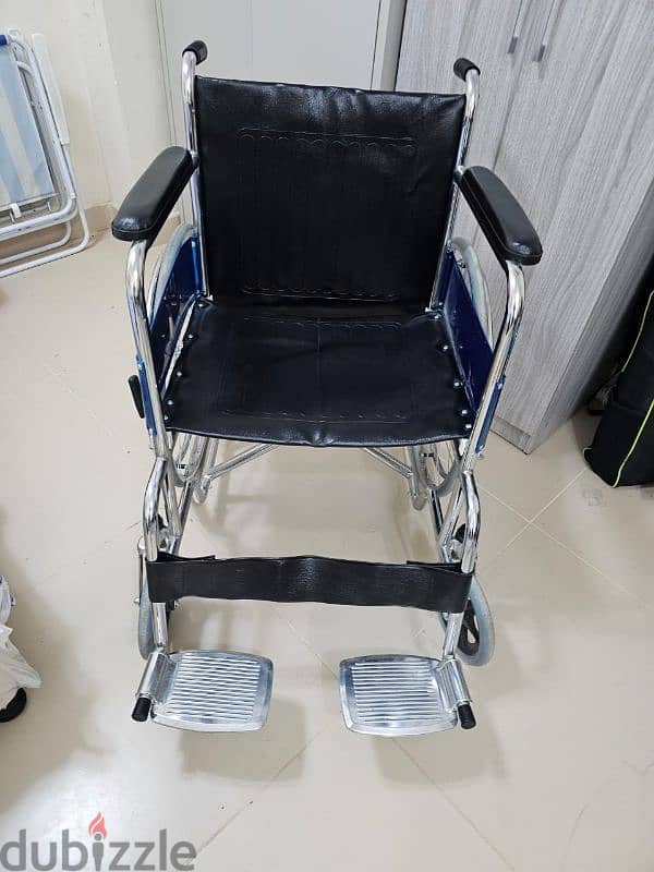 WHEEL CHAIR JUST LIKE NEW. 2