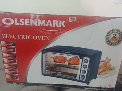 I am selling Olsenmark Electric Oven 70L with rotisserie