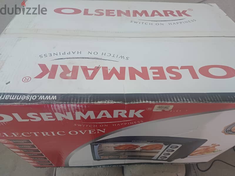 I am selling Olsenmark Electric Oven 70L with rotisserie 1