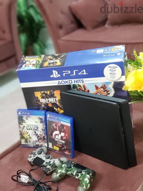 PS4 SLIM 500GB with 2 joystick with 5 games 3