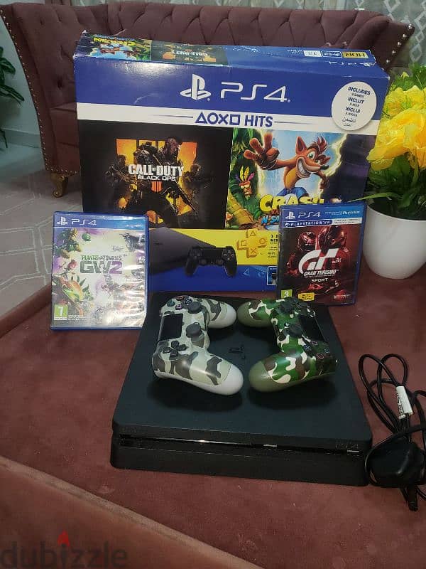 PS4 SLIM 500GB with 2 joystick with 5 games 4