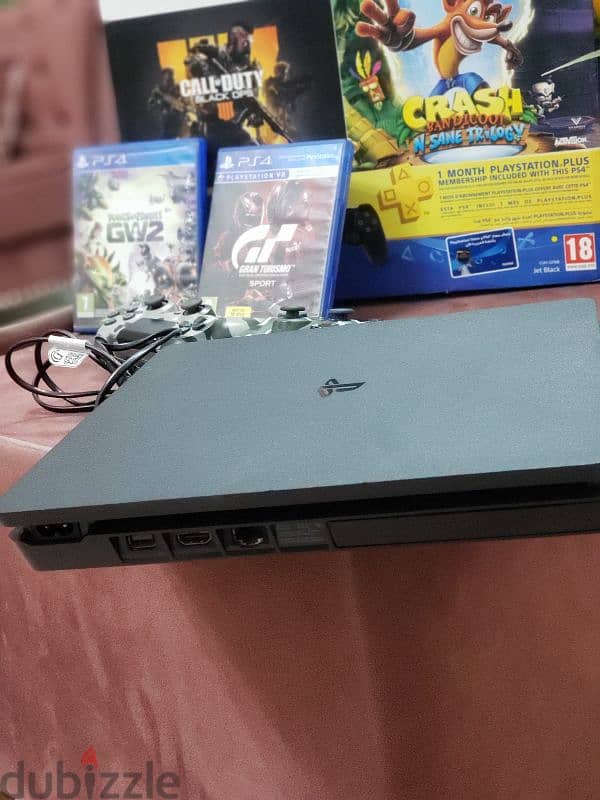 PS4 SLIM 500GB with 2 joystick with 5 games 6