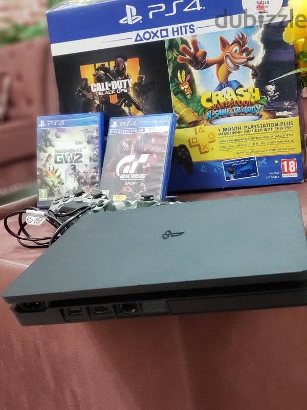 PS4 SLIM 500GB with 2 joystick with 5 games 7