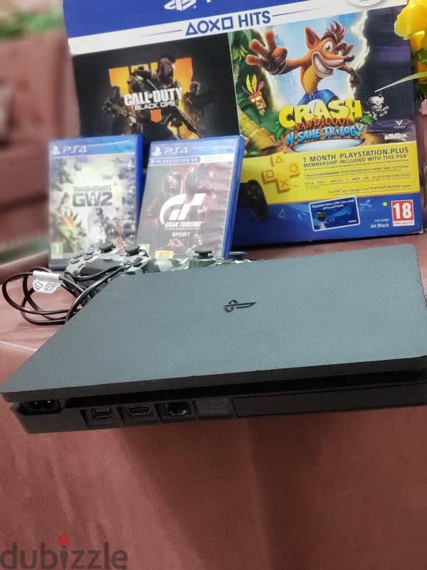 PS4 SLIM 500GB with 2 joystick with 5 games 8