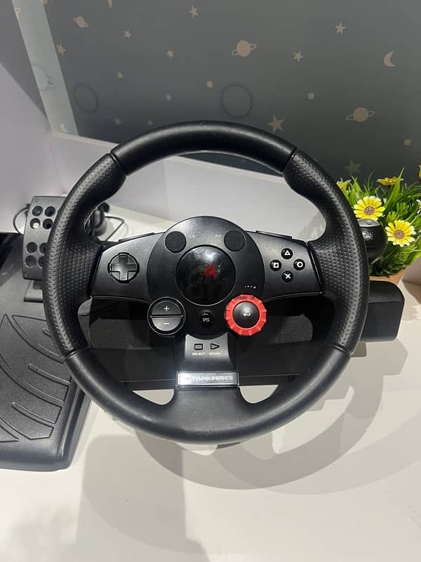 ‏logitech driving force gt steering wheel 1