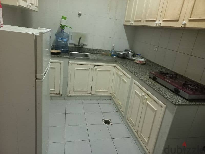 room with attached bathroom, kitchen sharing 3