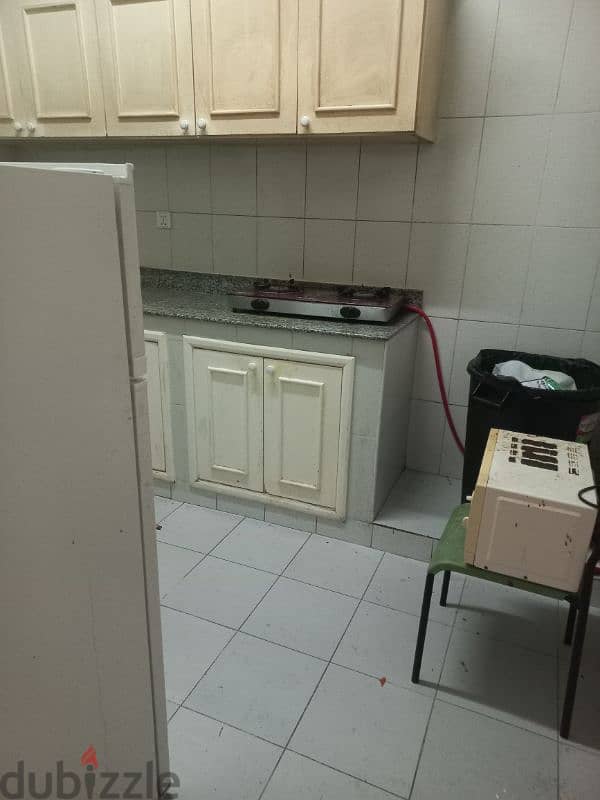 room with attached bathroom, kitchen sharing 4