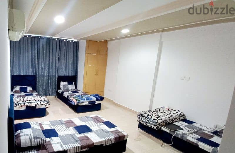 Exclusive new bed space for rent in Al Ghubrah main road 0