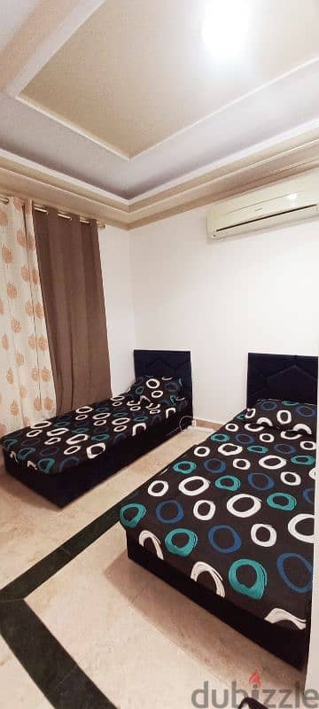 Exclusive new bed space for rent in Al Ghubrah main road 1