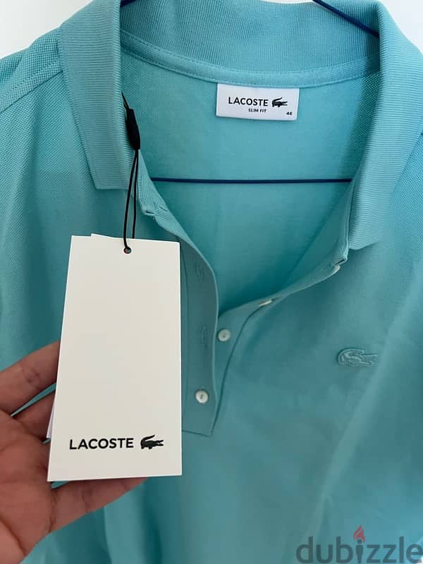 brand new Lacoste polo for woman 0