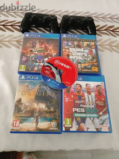 PS4 in good condition with 4 Games and 2 controllers