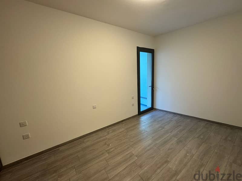 2 BR Spacious Corner Apartment in Boulevard, Muscat Hills 11