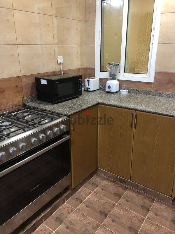 family room with neat and clean with kitchen and WiFi near Al ghubrah 10