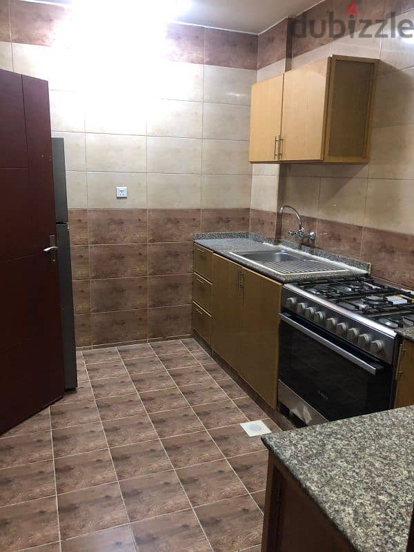 family room with neat and clean with kitchen and WiFi near Al ghubrah 11